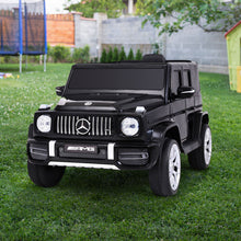 kidscarz.com.au, buy Licensed Mercedes Benz AMG G63 toy car with Remote Control - Kids Ride, electric toy cars and more, affordable Ride ons in Australia Licensed Mercedes Benz AMG G63 toy car with Remote Control - Kids Ride On Electric Car from kidscarz.com.au, we sell affordable ride on toys, free shipping Australia wide, Load image into Gallery viewer, Outdoors Side view of a black Licensed Mercedes Benz AMG G63 toy car with Remote Control - Affordable Kids Ride On Electric Car for Australian children